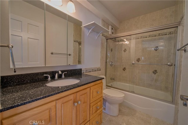 201 Calle Miramar Unit 16, Redondo Beach, CA 90277 - bathroom with vanity, toilet, tile patterned flooring, and enclosed tub / shower combo