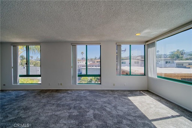 201 Calle Miramar Unit 16, Redondo Beach, CA 90277 - carpeted spare room featuring a textured ceiling