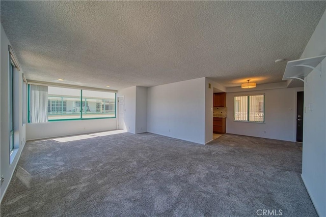 201 Calle Miramar Unit 16, Redondo Beach, CA 90277 - carpeted empty room with a textured ceiling