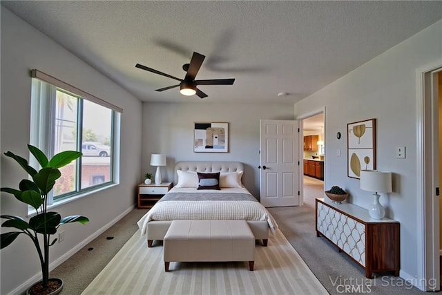 201 Calle Miramar Unit 16, Redondo Beach, CA 90277 - bedroom with carpet flooring, a textured ceiling, ceiling fan, and baseboards