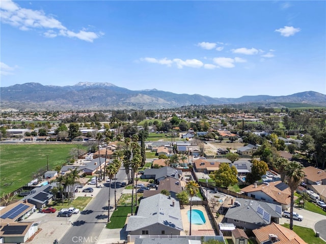 drone / aerial view with a residential view and a mountain view