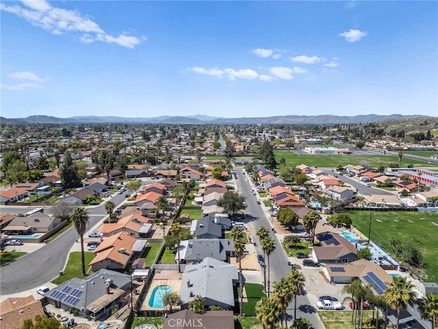 aerial view with a mountain view and a residential view