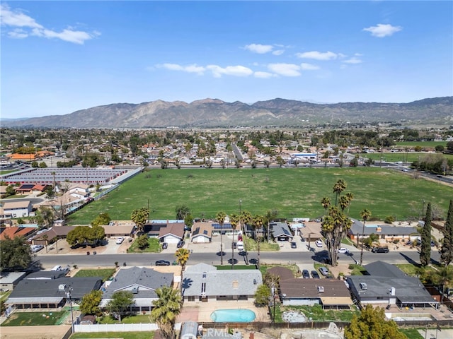 bird's eye view with a residential view and a mountain view