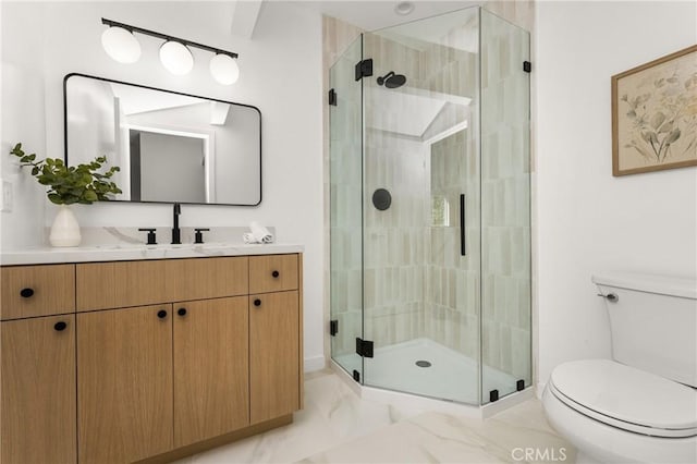 full bath featuring marble finish floor, toilet, vanity, and a stall shower