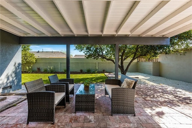 view of patio / terrace with a fenced backyard and an outdoor living space