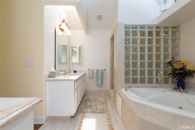 bathroom featuring vanity, tile patterned floors, a stall shower, visible vents, and a bath