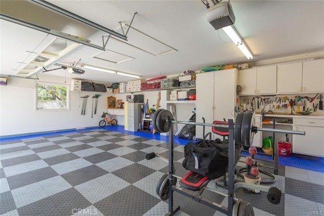 garage featuring a garage door opener