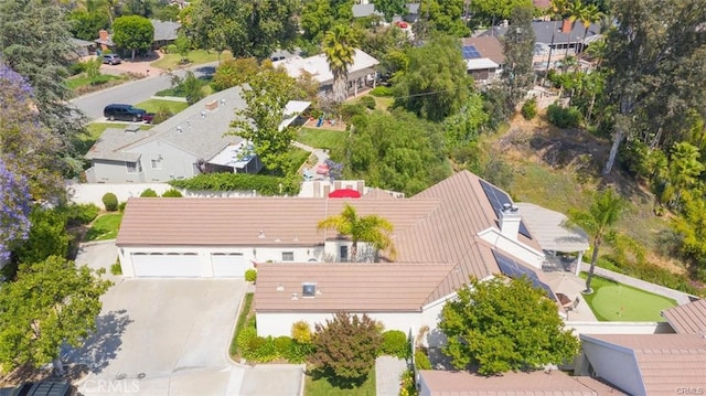 birds eye view of property with a residential view