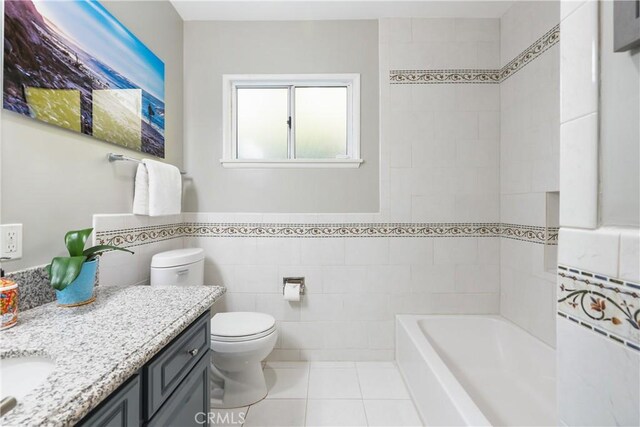 410 Via Mesa Grande, Redondo Beach, CA 90277 - bathroom with vanity, tile walls, toilet, a tub to relax in, and tile patterned floors