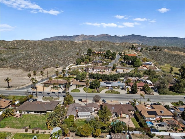 drone / aerial view featuring a mountain view and a residential view