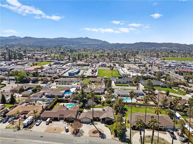 birds eye view of property featuring a residential view and a mountain view