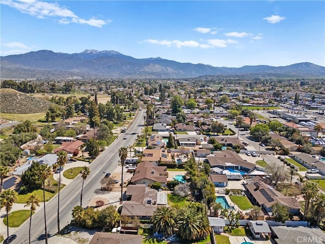birds eye view of property with a residential view and a mountain view