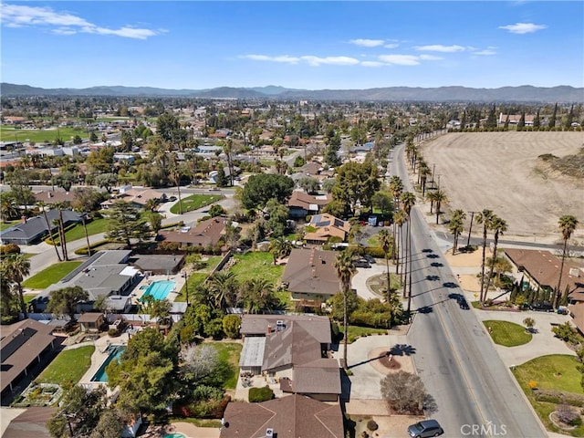 bird's eye view with a residential view and a mountain view