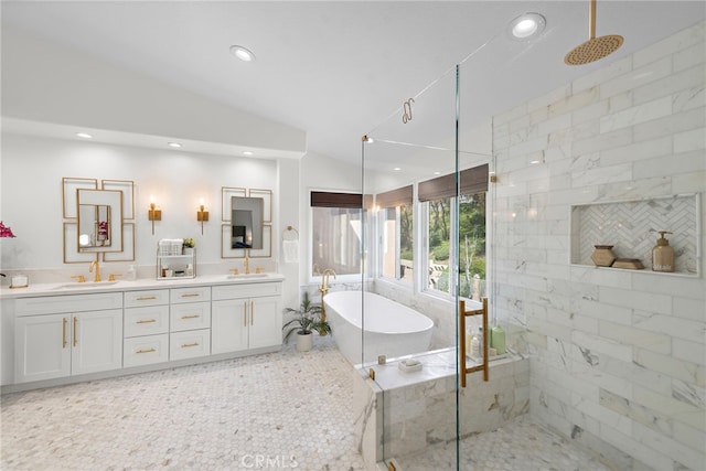19732 Torres, Lake Forest, CA 92679 - bathroom featuring walk in shower, double vanity, a freestanding tub, lofted ceiling, and recessed lighting