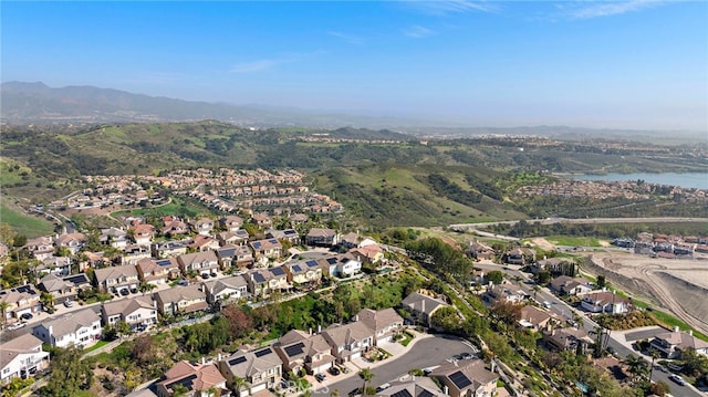 19732 Torres, Lake Forest, CA 92679 - aerial view of property's location featuring nearby suburban area and a water and mountain view