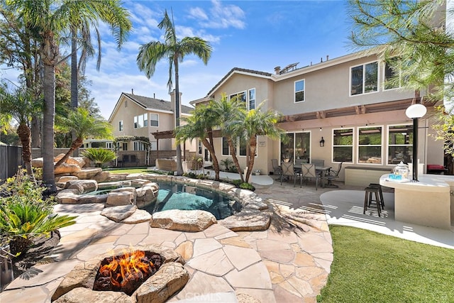 19732 Torres, Lake Forest, CA 92679 - view of pool with a fire pit, a patio, and outdoor dining area
