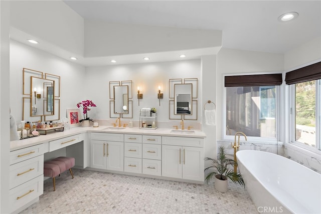 19732 Torres, Lake Forest, CA 92679 - bathroom with double vanity, a freestanding bath, recessed lighting, and lofted ceiling