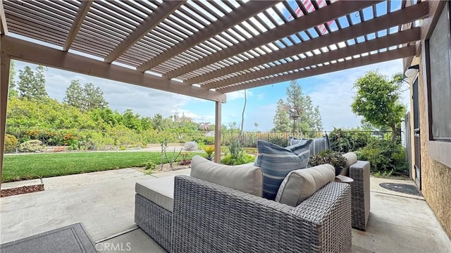 view of patio with a pergola and fence