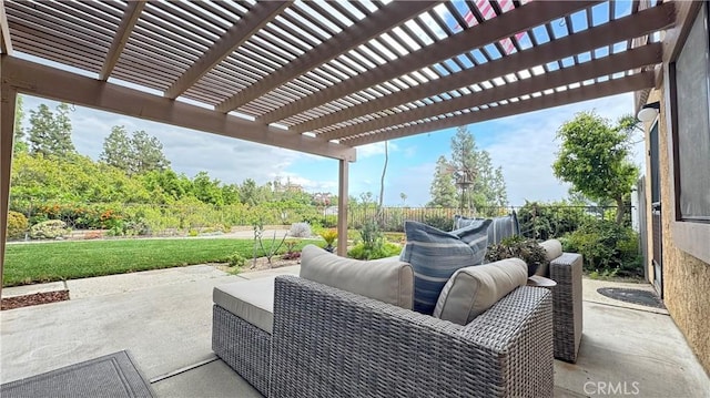view of patio with a pergola and fence