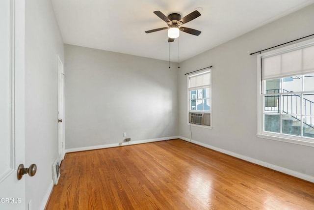 646 Orange Grove Ave, South Pasadena, CA 91030 - empty room with cooling unit, baseboards, visible vents, ceiling fan, and wood finished floors