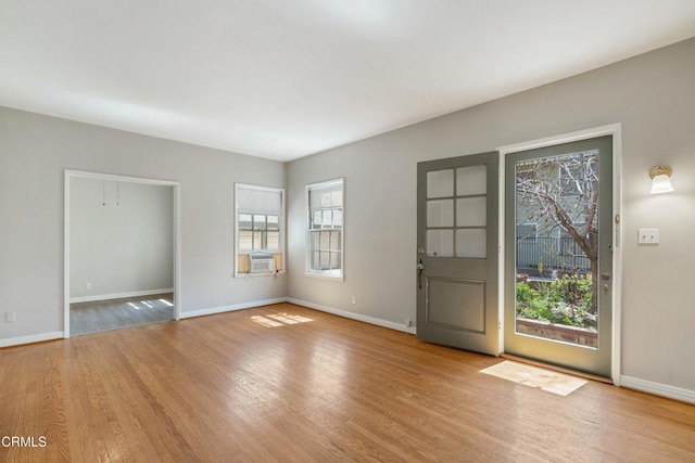 646 Orange Grove Ave, South Pasadena, CA 91030 - foyer entrance featuring baseboards, cooling unit, and wood finished floors