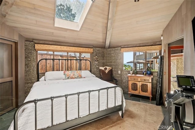 2431 Sherwood Dr, Cambria, CA 93428 - bedroom with vaulted ceiling with skylight and wood ceiling