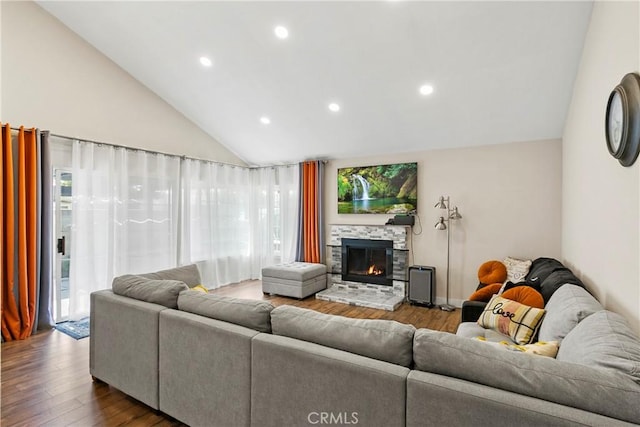 26211 Avenida Deseo, Mission Viejo, CA 92691 - living room with dark wood-type flooring, a fireplace, recessed lighting, and high vaulted ceiling