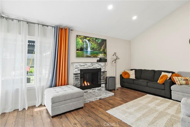 26211 Avenida Deseo, Mission Viejo, CA 92691 - living room featuring hardwood / wood-style flooring, recessed lighting, a fireplace, and vaulted ceiling