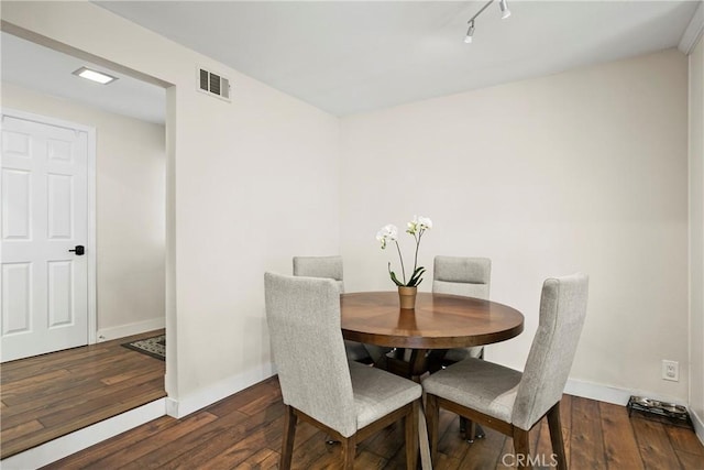 26211 Avenida Deseo, Mission Viejo, CA 92691 - dining space with hardwood / wood-style flooring and rail lighting