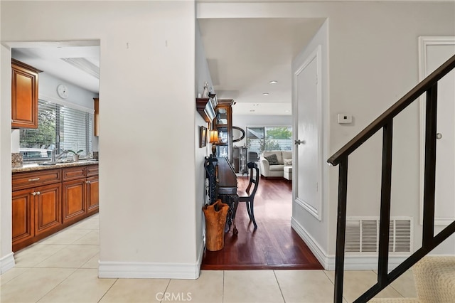 18815 Thornwood Cir Unit Ci32, Huntington Beach, CA 92646 - interior space with stairway, a healthy amount of sunlight, light tile patterned floors, and visible vents