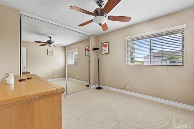 18815 Thornwood Cir Unit Ci32, Huntington Beach, CA 92646 - interior space featuring baseboards, a ceiling fan, and light carpet