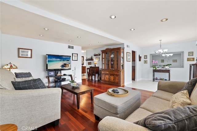 18815 Thornwood Cir Unit Ci32, Huntington Beach, CA 92646 - living room with wood finished floors, visible vents, recessed lighting, and a notable chandelier