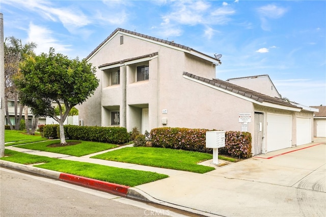 18815 Thornwood Cir Unit Ci32, Huntington Beach, CA 92646 - view of property with an attached garage and concrete driveway