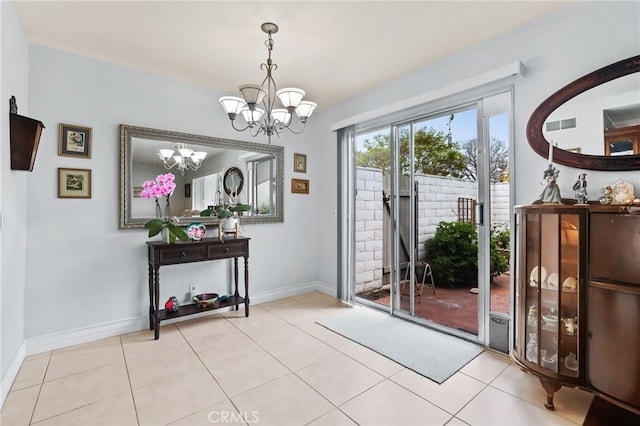 18815 Thornwood Cir Unit Ci32, Huntington Beach, CA 92646 - doorway to outside featuring visible vents, a notable chandelier, tile patterned flooring, and baseboards