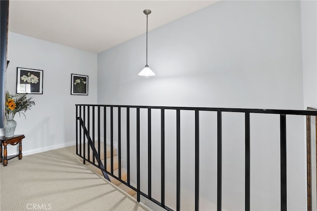 18815 Thornwood Cir Unit Ci32, Huntington Beach, CA 92646 - hallway featuring carpet, baseboards, and an upstairs landing