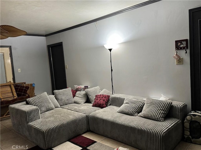 living room featuring ornamental molding and light tile patterned floors