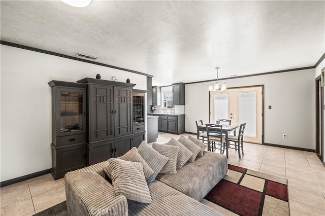 5956 York Glen Way, Sacramento, CA 95842 - living room with crown molding, light tile patterned floors, baseboards, and a chandelier