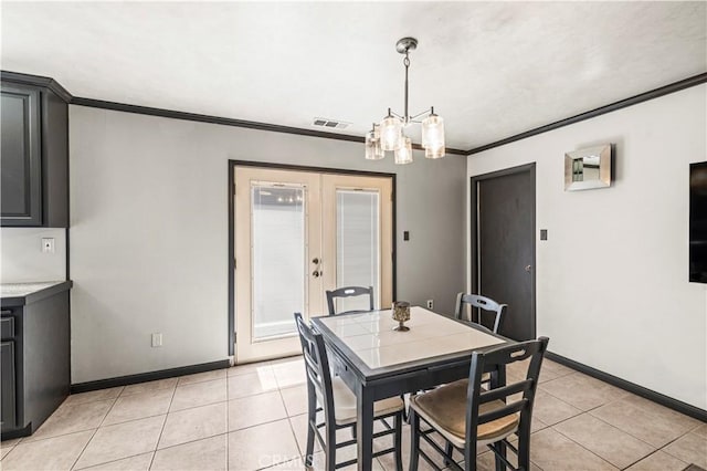 5956 York Glen Way, Sacramento, CA 95842 - dining space featuring light tile patterned floors, crown molding, a chandelier, french doors, and baseboards