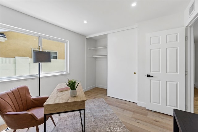 7042 Stonewood Dr, Huntington Beach, CA 92647 - office with visible vents, light wood-style floors, and recessed lighting