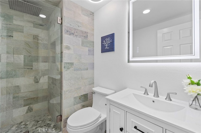 7042 Stonewood Dr, Huntington Beach, CA 92647 - bathroom featuring toilet, vanity, and a stall shower