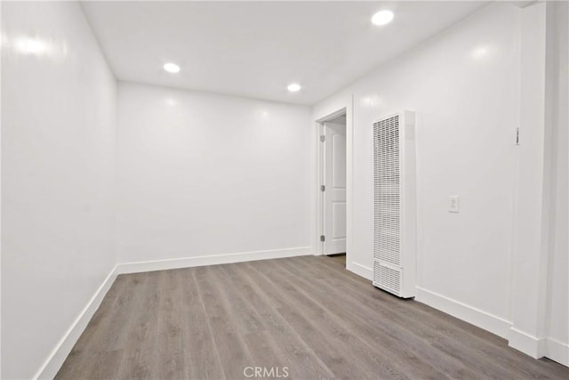 2619 Alice St, Los Angeles, CA 90065 - unfurnished room with recessed lighting, a heating unit, baseboards, and wood finished floors