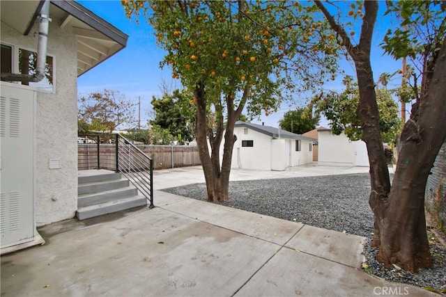2619 Alice St, Los Angeles, CA 90065 - view of patio with an outbuilding and fence