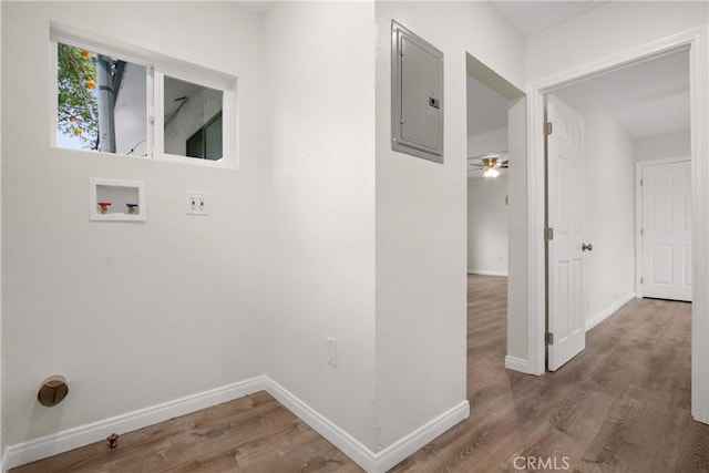 2619 Alice St, Los Angeles, CA 90065 - laundry room featuring electric panel, baseboards, washer hookup, and wood finished floors