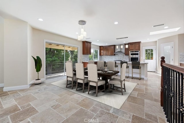 1730 Sunny Knl, Fullerton, CA 92835 - dining area featuring stone tile floors and recessed lighting