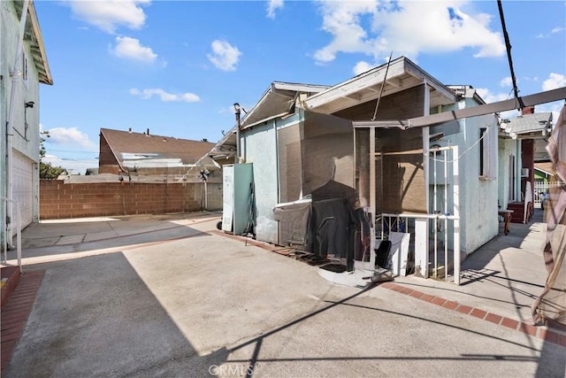 178 E 49th St, Los Angeles, CA 90011 - exterior space featuring stucco siding, fence, and a patio