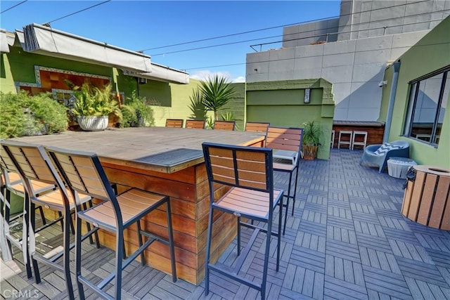 view of patio / terrace featuring outdoor dry bar
