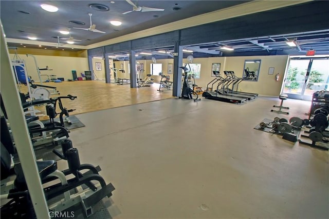 gym featuring ceiling fan and visible vents