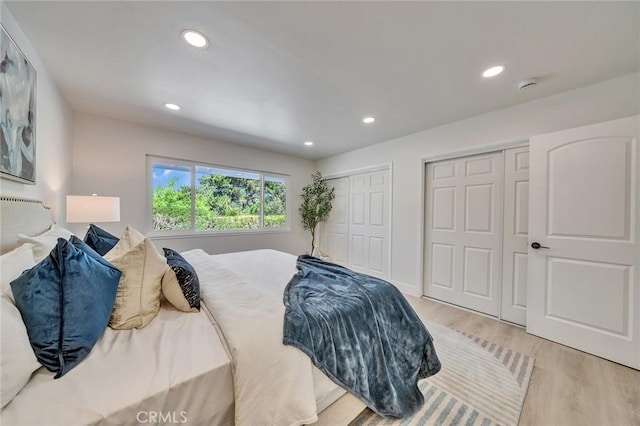 29461 Via Valverde, Laguna Niguel, CA 92677 - bedroom with multiple closets, wood finished floors, and recessed lighting