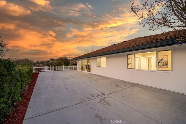 29461 Via Valverde, Laguna Niguel, CA 92677 - view of side of home with stucco siding, fence, and a patio area