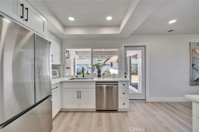 29461 Via Valverde, Laguna Niguel, CA 92677 - kitchen featuring light countertops, light wood-type flooring, appliances with stainless steel finishes, and a sink